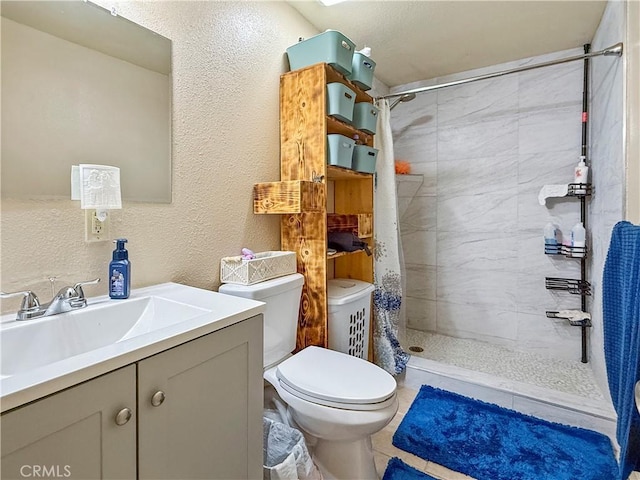 26731 Greenvale Way, Desert Center, CA 92239 - full bathroom featuring a tile shower, toilet, and vanity