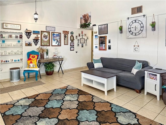 26731 Greenvale Way, Desert Center, CA 92239 - living room with tile patterned flooring and high vaulted ceiling
