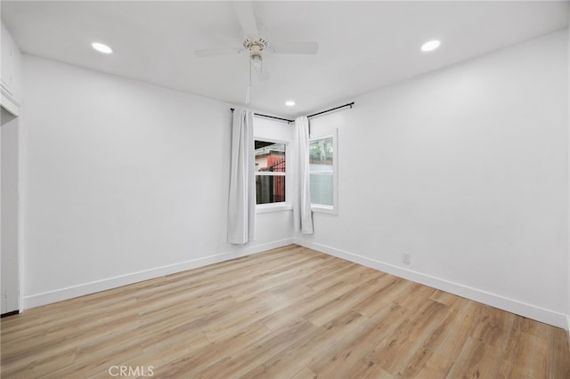 11867 S San Pedro St, Los Angeles, CA 90061 - empty room featuring a ceiling fan, baseboards, recessed lighting, and wood finished floors