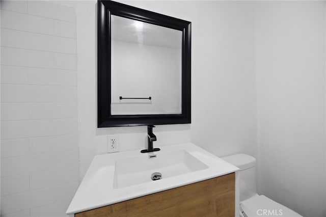 11867 S San Pedro St, Los Angeles, CA 90061 - bathroom with toilet and vanity