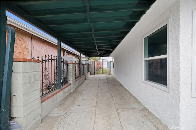 11867 S San Pedro St, Los Angeles, CA 90061 - view of property exterior featuring fence, a gate, and stucco siding