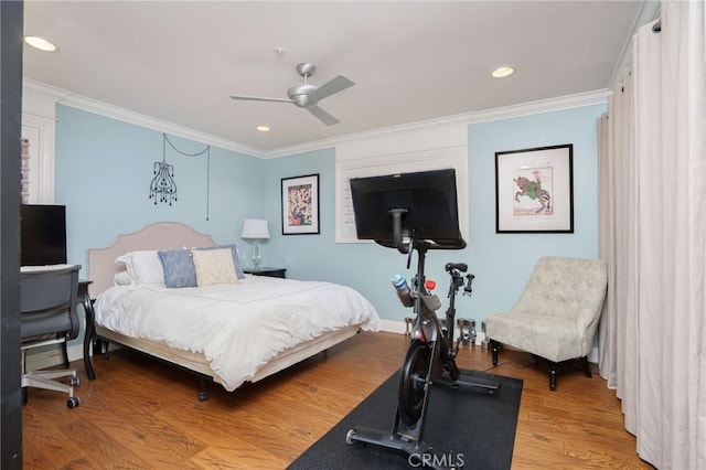 bedroom featuring crown molding, recessed lighting, a ceiling fan, and wood finished floors