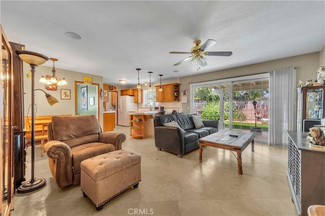 living room featuring a ceiling fan