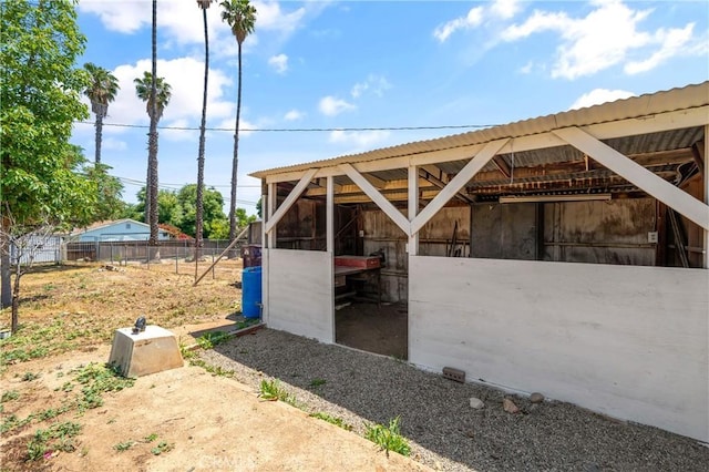 exterior space featuring an outbuilding and an exterior structure