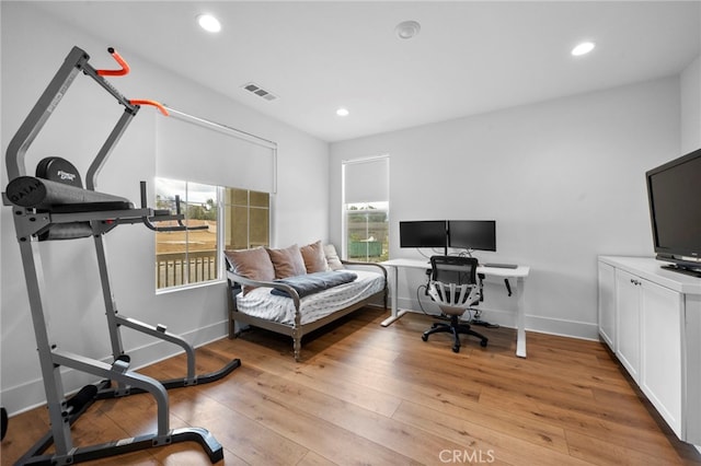office with recessed lighting, baseboards, visible vents, and light wood-style flooring