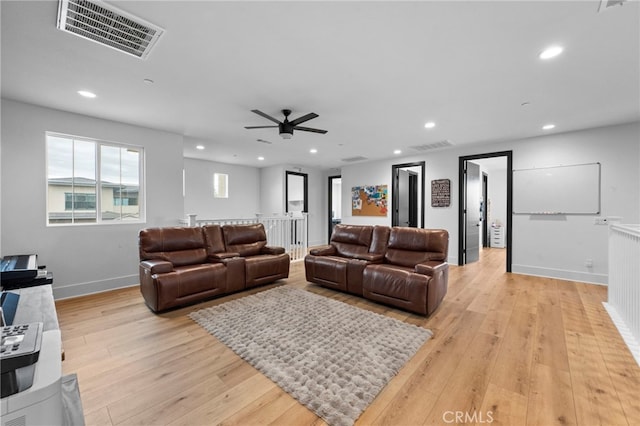 living area featuring visible vents, recessed lighting, light wood finished floors, and ceiling fan