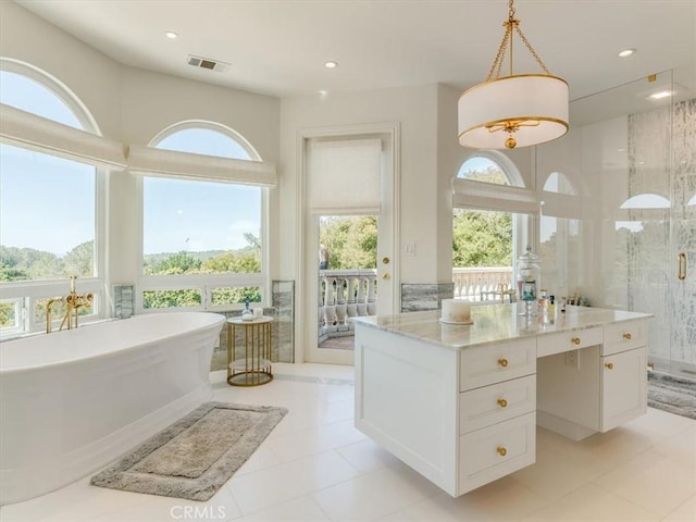full bath with a freestanding bath, vanity, recessed lighting, visible vents, and a stall shower