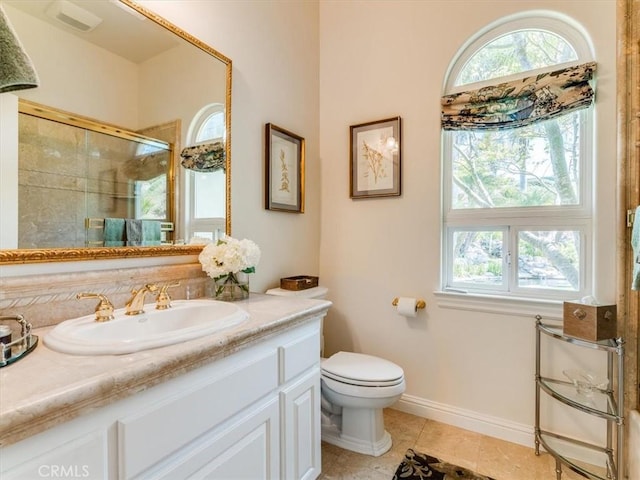 full bath with an enclosed shower, toilet, plenty of natural light, and tile patterned flooring