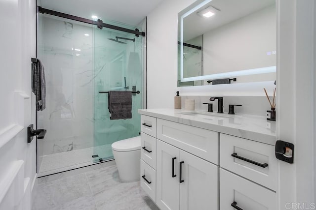 full bath with a marble finish shower, vanity, toilet, and marble finish floor