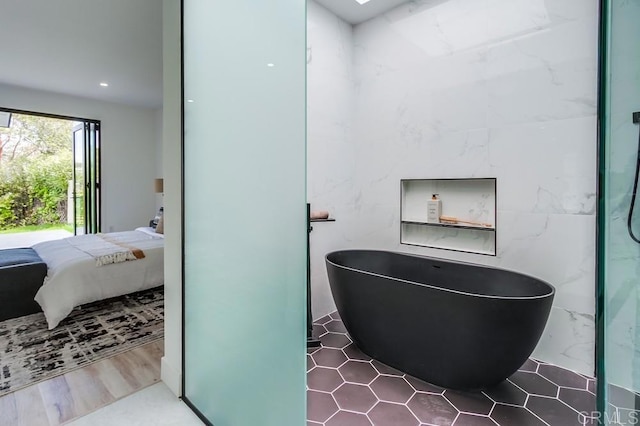 full bath featuring a freestanding bath