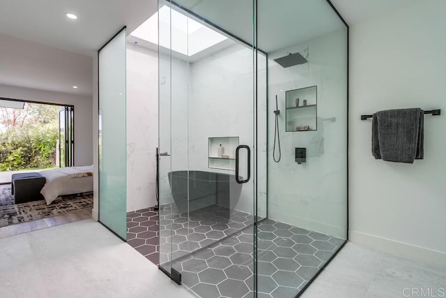 ensuite bathroom featuring ensuite bathroom, recessed lighting, and a marble finish shower