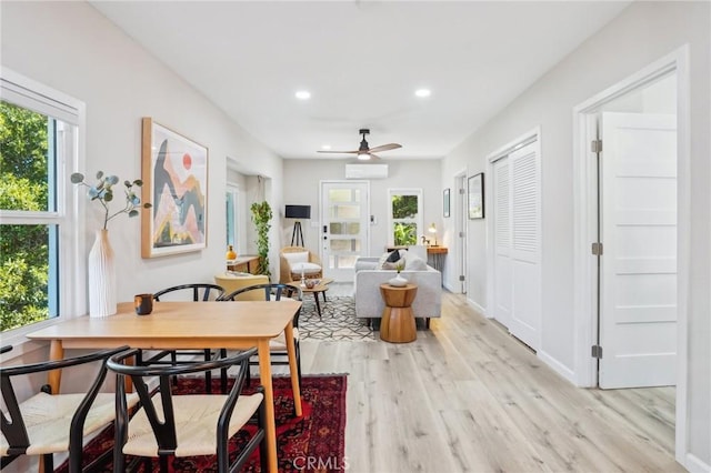 dining area with recessed lighting, ceiling fan, plenty of natural light, and light wood-style floors