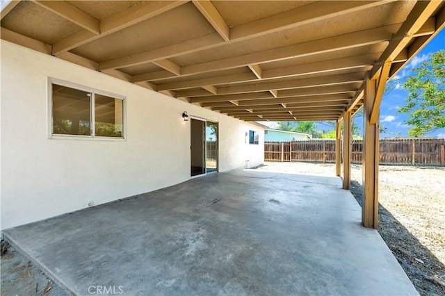 view of patio with fence