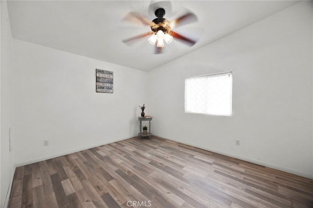 12859 Danbury St, Whitewater, CA 92282 - unfurnished room featuring wood finished floors, vaulted ceiling, ceiling fan, and baseboards