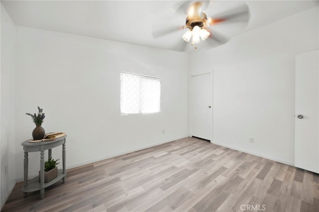 12859 Danbury St, Whitewater, CA 92282 - unfurnished room featuring a ceiling fan, light wood-style flooring, and baseboards