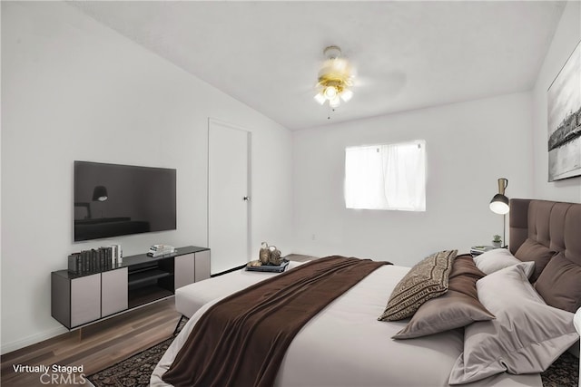 12859 Danbury St, Whitewater, CA 92282 - bedroom featuring wood finished floors, vaulted ceiling, and ceiling fan