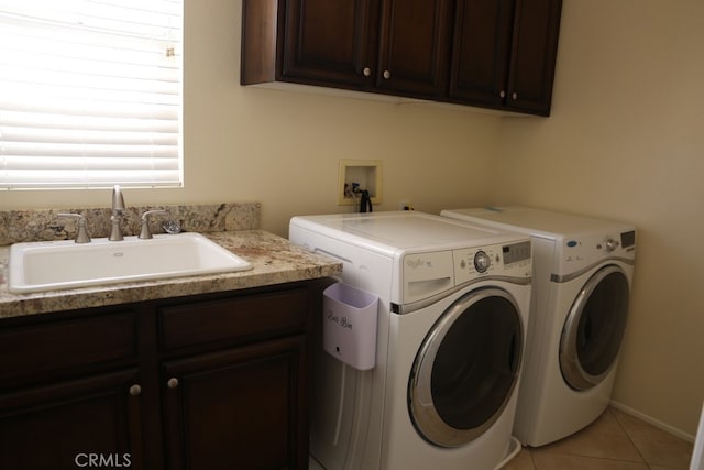 1730 W Alps Dr, Upland, CA 91784 - laundry room featuring cabinet space, separate washer and dryer, and light tile patterned floors