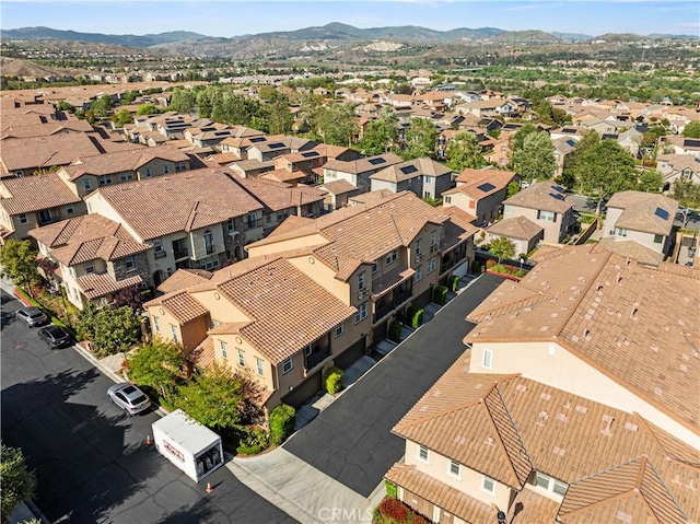 bird's eye view featuring a residential view and a mountain view