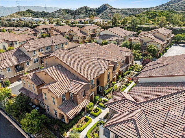 bird's eye view featuring a residential view and a mountain view