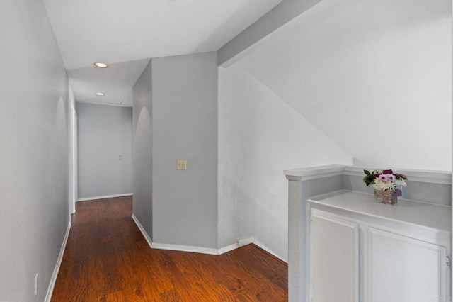 hall featuring recessed lighting, baseboards, lofted ceiling with beams, and wood finished floors
