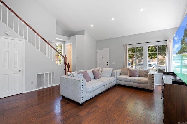 living room featuring visible vents, dark wood-style flooring, high vaulted ceiling, stairway, and recessed lighting