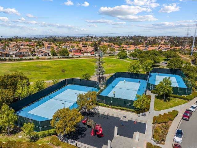 birds eye view of property with a residential view