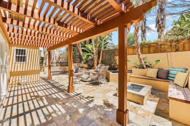 view of patio featuring a pergola, a fenced backyard, and an outdoor living space with a fire pit
