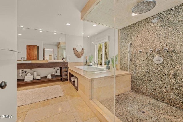 bathroom featuring a walk in shower, recessed lighting, tile patterned flooring, and vanity
