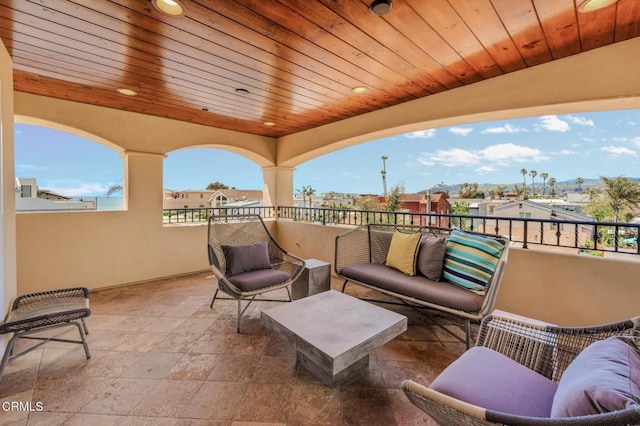 view of patio / terrace with a balcony