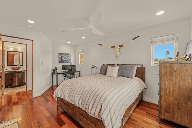 bedroom featuring recessed lighting, baseboards, and light wood-style floors