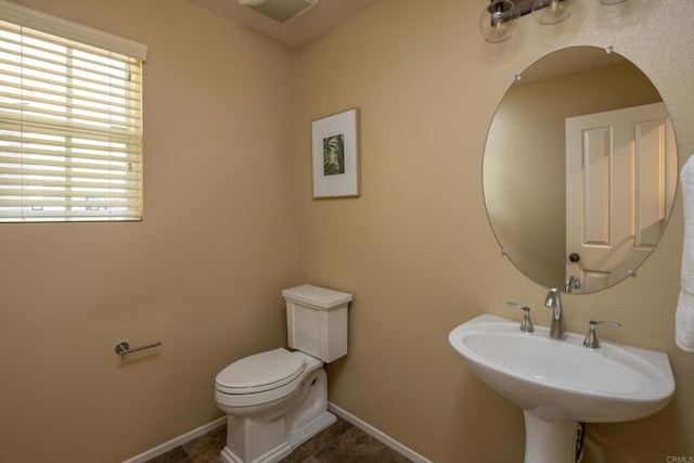 1185 Parkview Dr, Oceanside, CA 92057 - half bathroom with toilet, a sink, visible vents, and a wealth of natural light