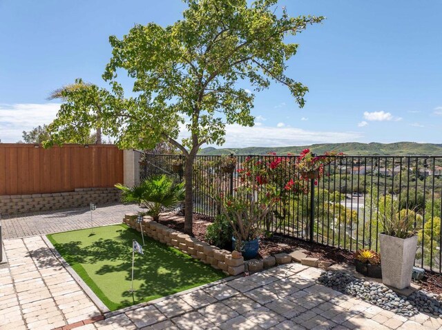 1185 Parkview Dr, Oceanside, CA 92057 - view of yard featuring a fenced backyard and a patio