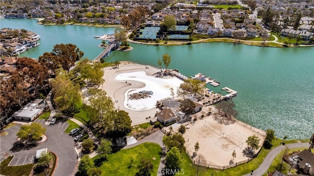 bird's eye view with a water view and a residential view