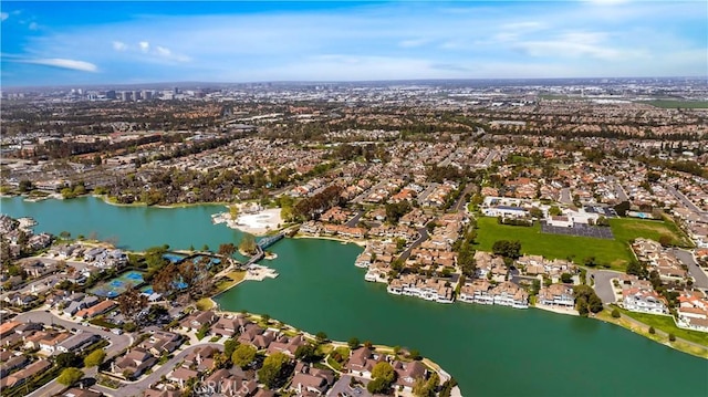 aerial view featuring a water view and a residential view