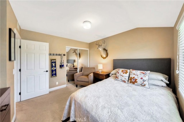 bedroom featuring baseboards, carpet, and a closet