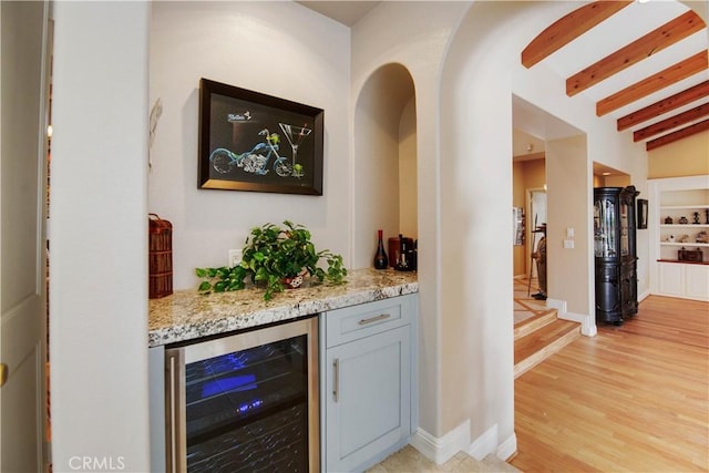3988 Keri Way, Fallbrook, CA 92028 - indoor dry bar with beverage cooler, beamed ceiling, light wood finished floors, and baseboards