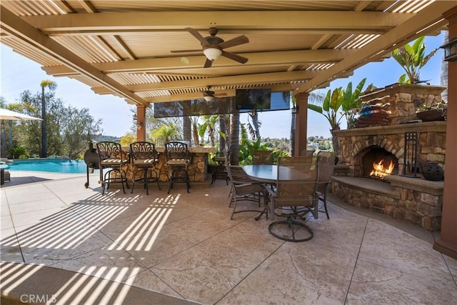 3988 Keri Way, Fallbrook, CA 92028 - view of patio / terrace featuring an outdoor stone fireplace, a ceiling fan, an outdoor pool, and a pergola