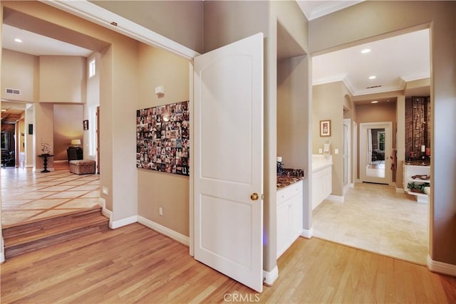 3988 Keri Way, Fallbrook, CA 92028 - hall featuring crown molding, light wood-style floors, recessed lighting, and baseboards