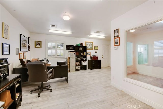 3988 Keri Way, Fallbrook, CA 92028 - home office with light wood-type flooring and baseboards