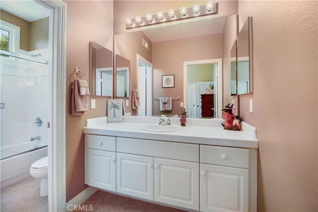 3988 Keri Way, Fallbrook, CA 92028 - bathroom with vanity, combined bath / shower with glass door, toilet, and baseboards