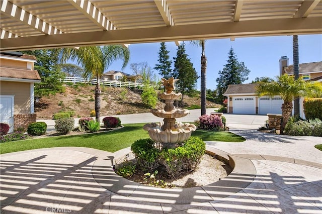 3988 Keri Way, Fallbrook, CA 92028 - view of patio with a pergola, concrete driveway, and a garage