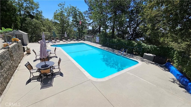 15 Ponderosa Pike, Running Springs, CA 92382 - community pool featuring a patio area, fence, and view of scattered trees