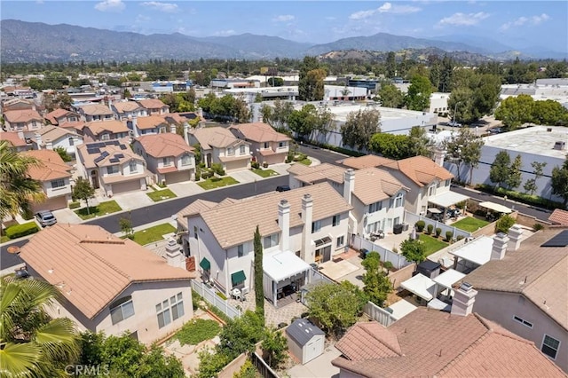 aerial view featuring a mountain view and a residential view