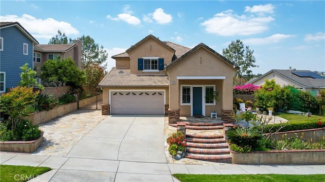 13837 Laguna St, La Mirada, CA 90638 - traditional-style house featuring an attached garage, fence, driveway, and stucco siding