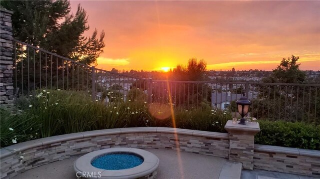 13837 Laguna St, La Mirada, CA 90638 - patio terrace at dusk featuring fence
