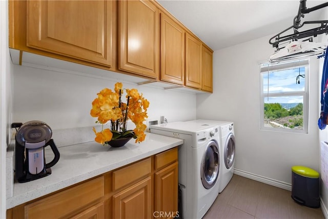 13837 Laguna St, La Mirada, CA 90638 - washroom with baseboards, cabinet space, light tile patterned floors, and separate washer and dryer