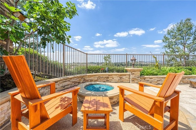 13837 Laguna St, La Mirada, CA 90638 - view of patio featuring a fenced backyard and an outdoor fire pit