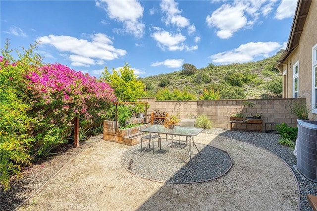 13837 Laguna St, La Mirada, CA 90638 - view of patio with central AC and fence