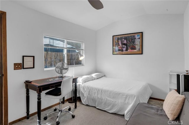 bedroom with baseboards, ceiling fan, lofted ceiling, and carpet floors