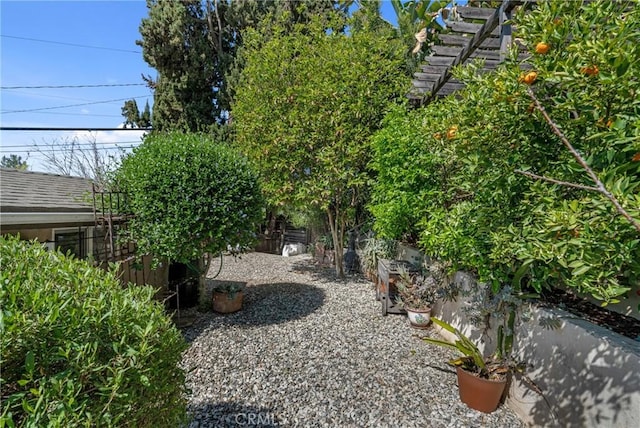 view of yard featuring fence